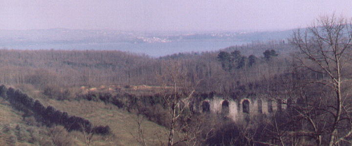 View of the Lake of Bracciano from Manziana: in the distance Anguillara, in the foreground arches of Acqua Paola