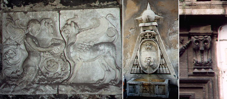 A relief in the courtyard of a palace in Via del Parione showing the symbol of the Rione, 
a modern fountain where the same symbol is inserted in a copy of the coats of arms which decorate Palazzo della Cancelleria, 
a detail of a portal in Piazza dei Satiri near Teatro di Pompeo